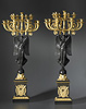 A large and important pair of Empire gilt and patinated bronze fourteen-light candelabra attributed to Pierre-Philippe Thomire after a design by Charles Percier